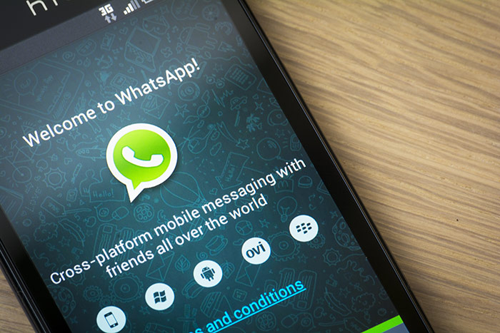 Smartphone showing "WhatsApp" instant messenging software